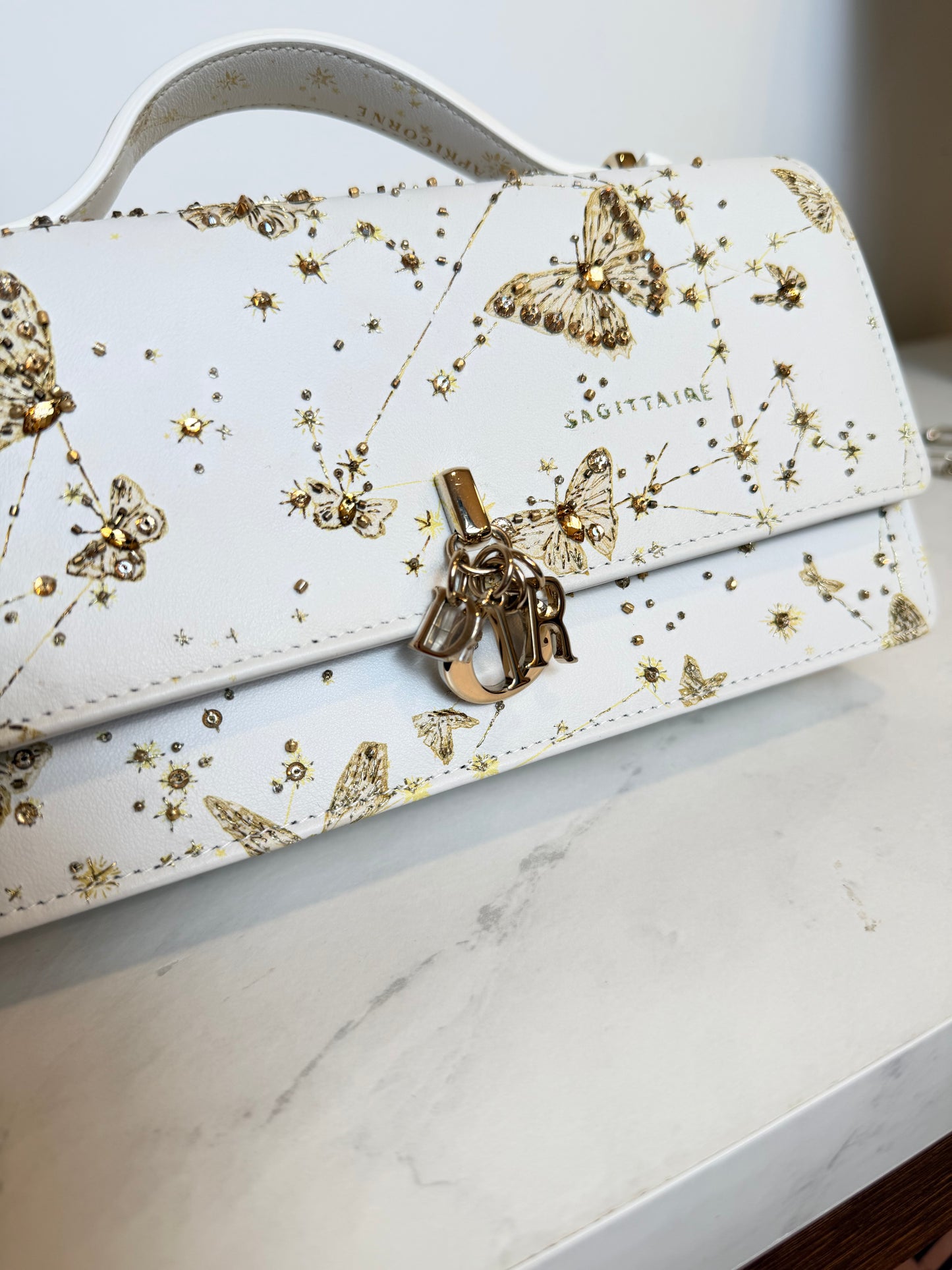 Dior Lady Dior East-West Chain Clutch | White Leather | Gold Hardware | Butterfly & Constellation Motif